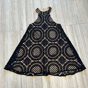 Judith March black lace swing dress.